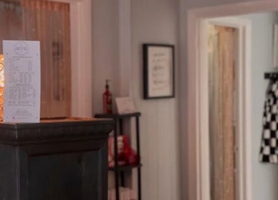 Warm-lit reception area at LSL Lash Studio Red Bank, Red Bank, New Jersey, US, with stylish decor.