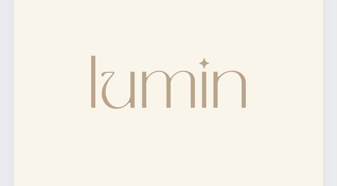 Elegant logo of Lumin Wellness + Beauty in Penryn, Cornwall, GB showcasing modern design.