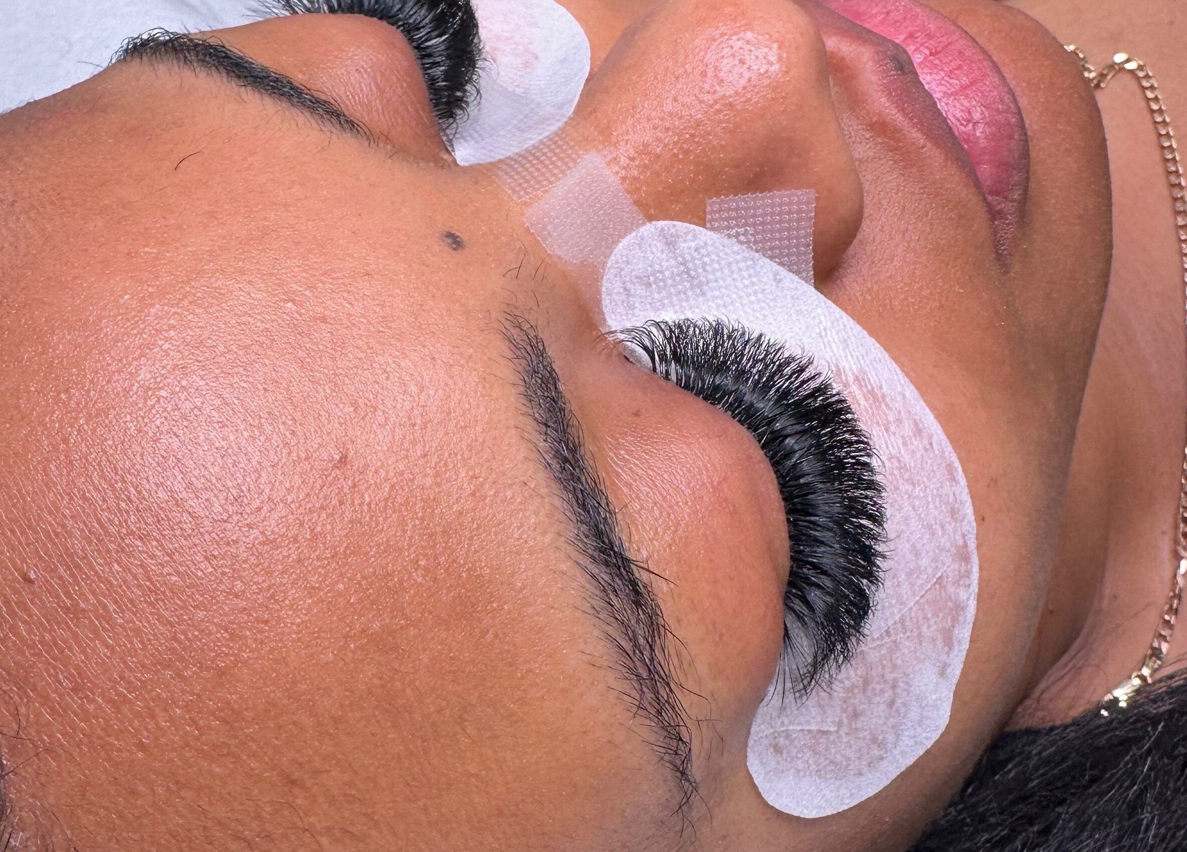 Close-up of eyelash extension application at The Face Studio, Aston-on-trent, England, GB.