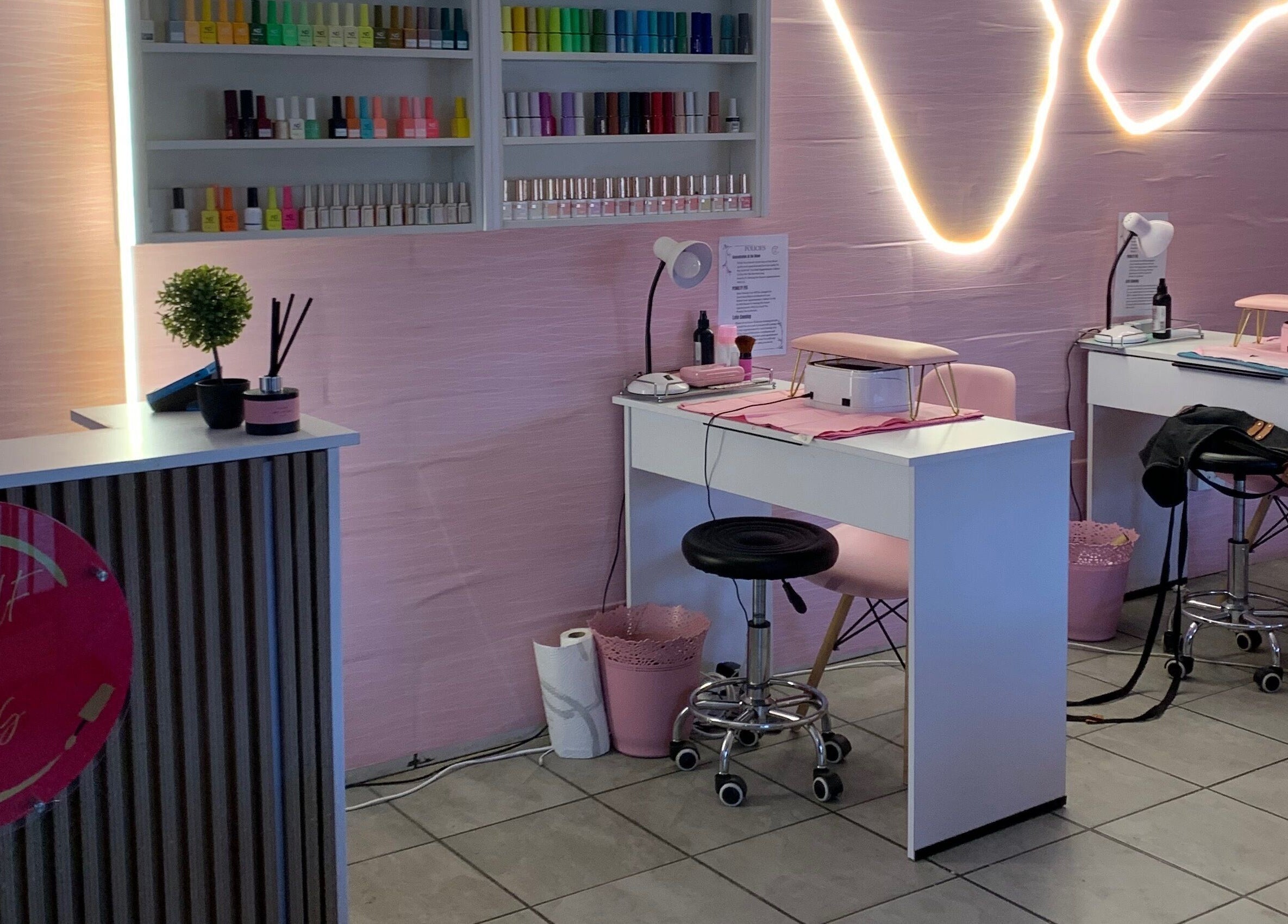 Stylish interior of Me Myself And Nails in Soweto, Gauteng, ZA with nail polishes and modern decor.
