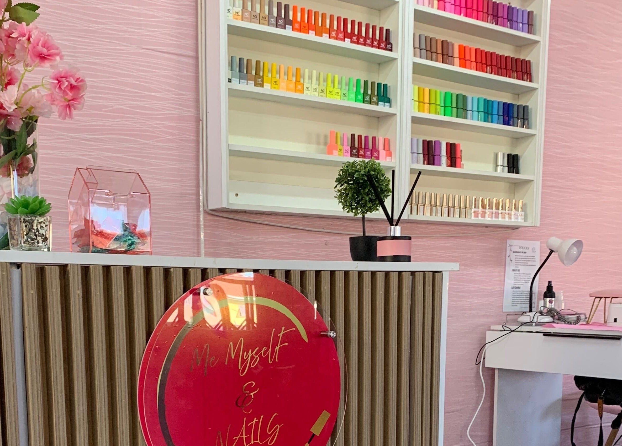 Colorful nail polish display at Me Myself And Nails in Soweto, Gauteng, ZA.