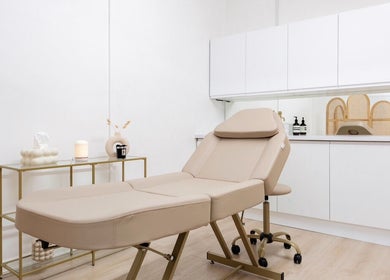 Luxurious treatment room at Skin and Co Aesthetics, Basingstoke, England, GB, featuring a plush spa bed.