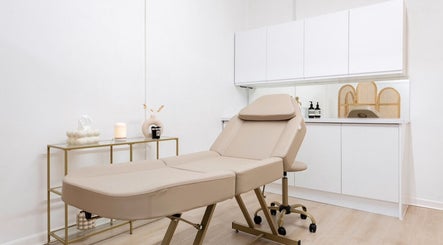 Luxurious treatment room at Skin and Co Aesthetics, Basingstoke, England, GB, featuring a plush spa bed.