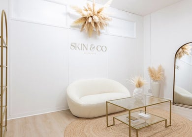 Elegant lounge area at Skin and Co Aesthetics in Basingstoke, England, GB. Modern decor and serene atmosphere.