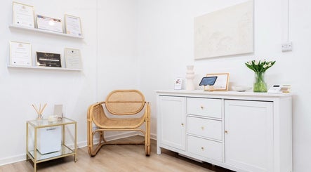 Inviting corner at Skin and Co Aesthetics, Basingstoke, England, GB with awards and decor on display.
