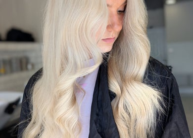 Close-up of styled blonde hair at Hair by Karina Brown, Leeds, England, GB.