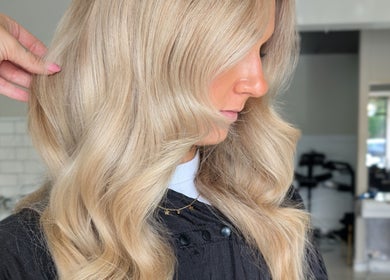 Close-up of styled blonde hair at Hair by Karina Brown, Leeds, England, GB.