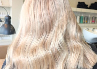 Blonde wavy hairstyle at Hair by Karina Brown, Leeds, England, GB.
