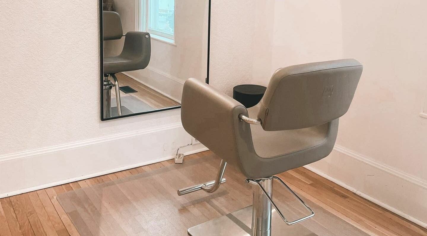 Elegant styling chair and mirror setup at Odette Hair Studio, Prince Edward, Ontario, CA.