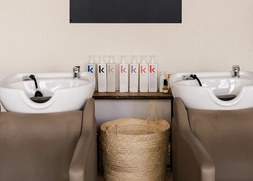 Modern wash stations at Odette Hair Studio in Prince Edward, Ontario, CA offering a luxurious hair care experience.