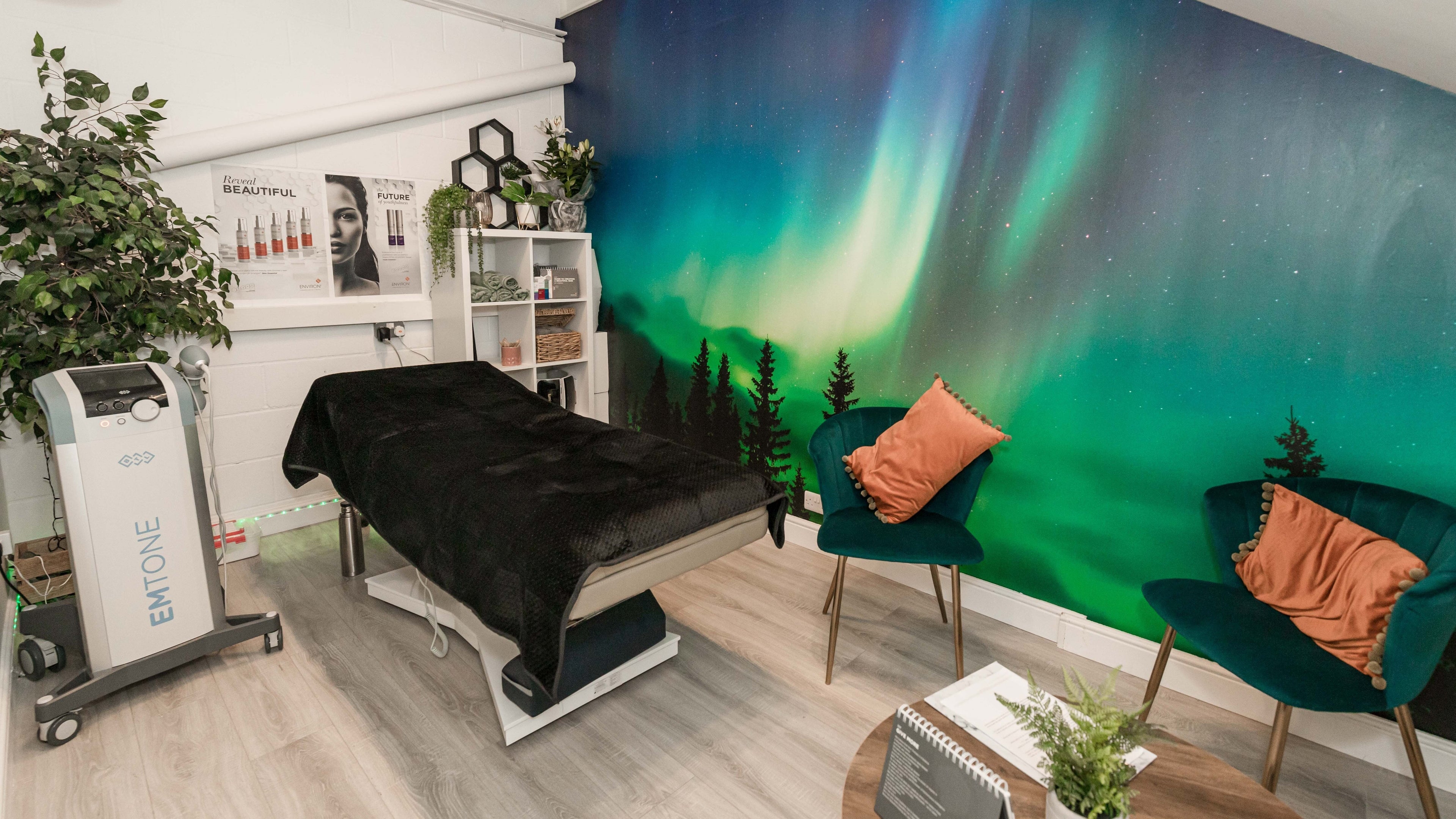 Relaxing therapy room at Beauty Sculpting Room Poole, Dorset, England, GB with aurora-themed decor.
