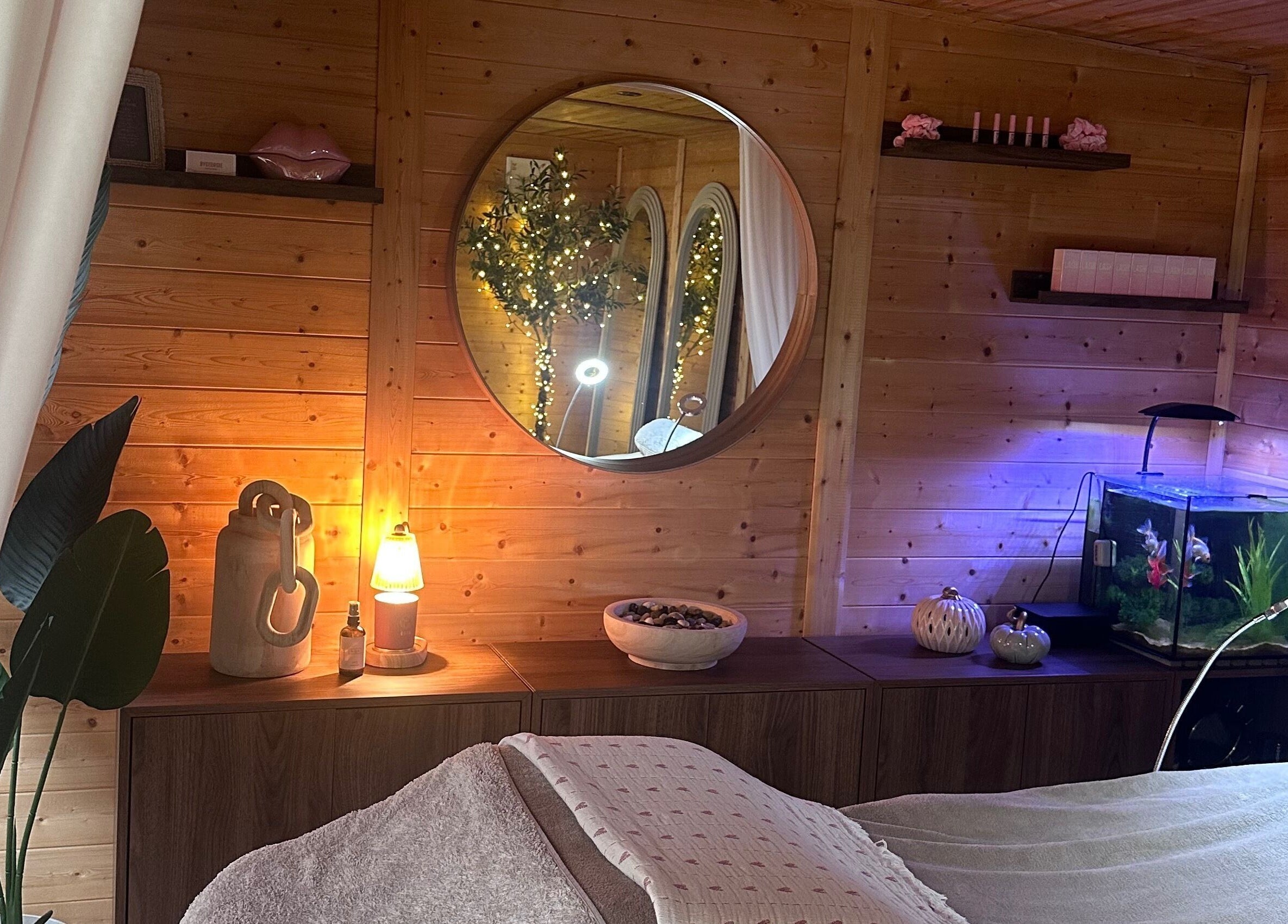 Cozy wellness room at By Georgie, Kenilworth, England, GB with warm lighting and decor.