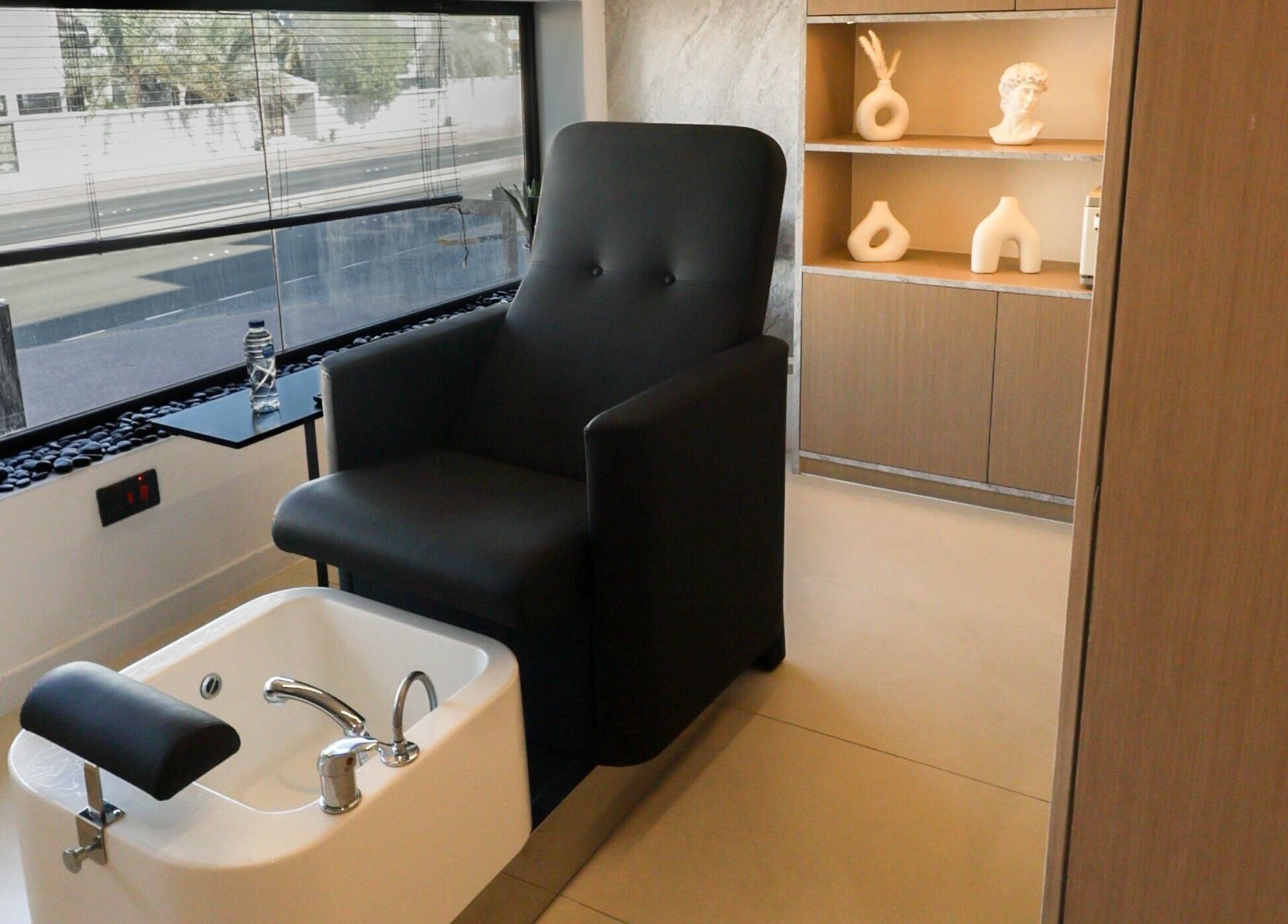 Pedicure chair and foot spa at Antibes Salon Riffa in Riffa, BH, offering a luxurious relaxation experience.