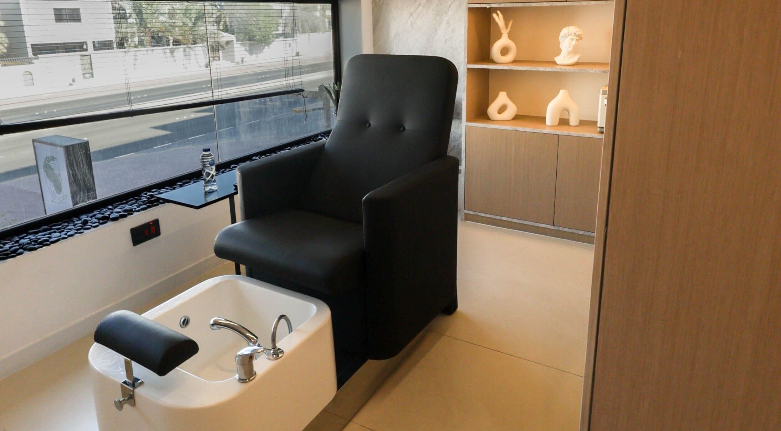Pedicure chair and foot spa at Antibes Salon Riffa in Riffa, BH, offering a luxurious relaxation experience.