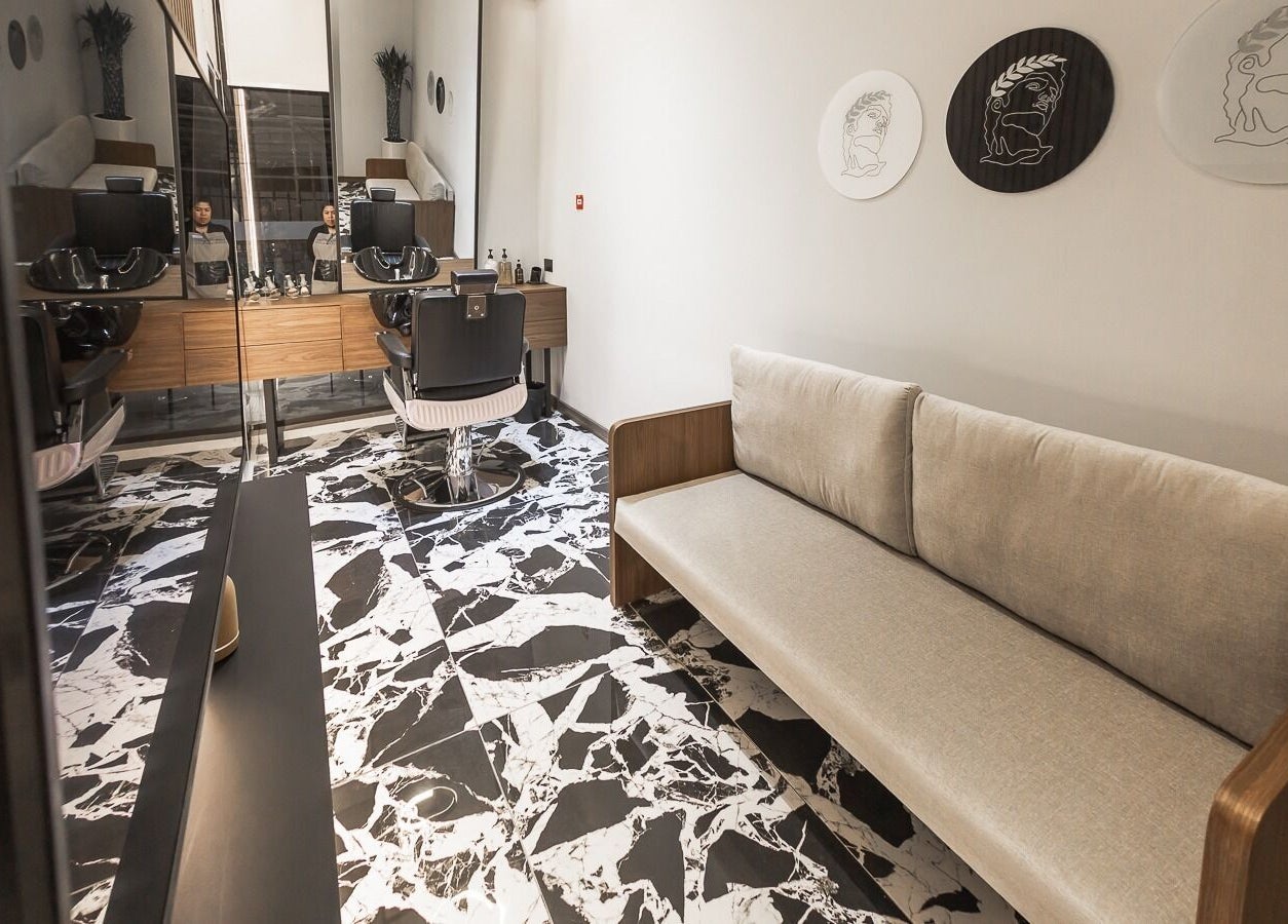 Modern interior of Antibes Salon Seef in Manama, BH, featuring stylish furnishings and elegant decor.