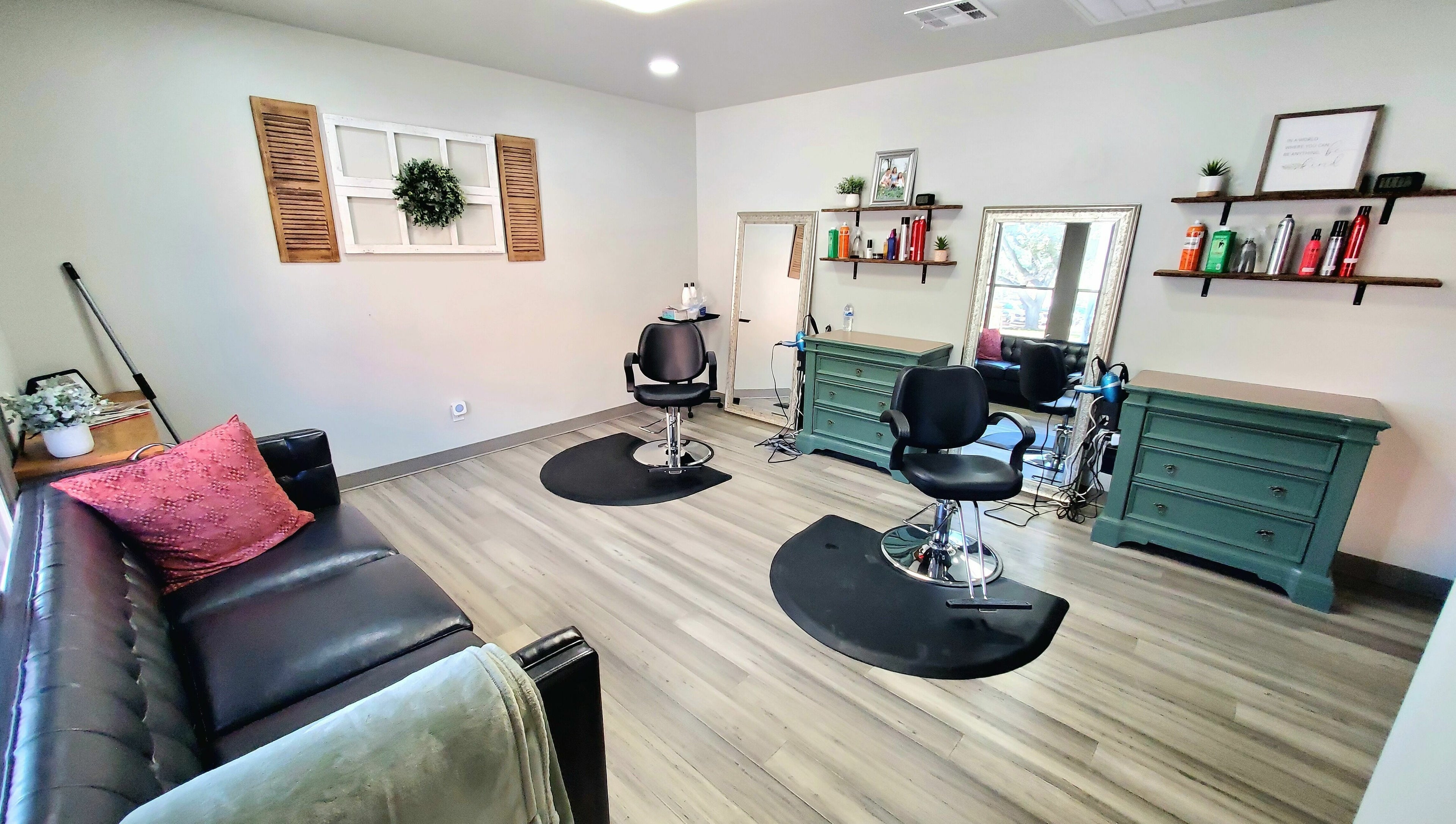 Modern salon interior at Live Oak Salon in Katy, Texas, US, featuring stylish seating and elegant decor.
