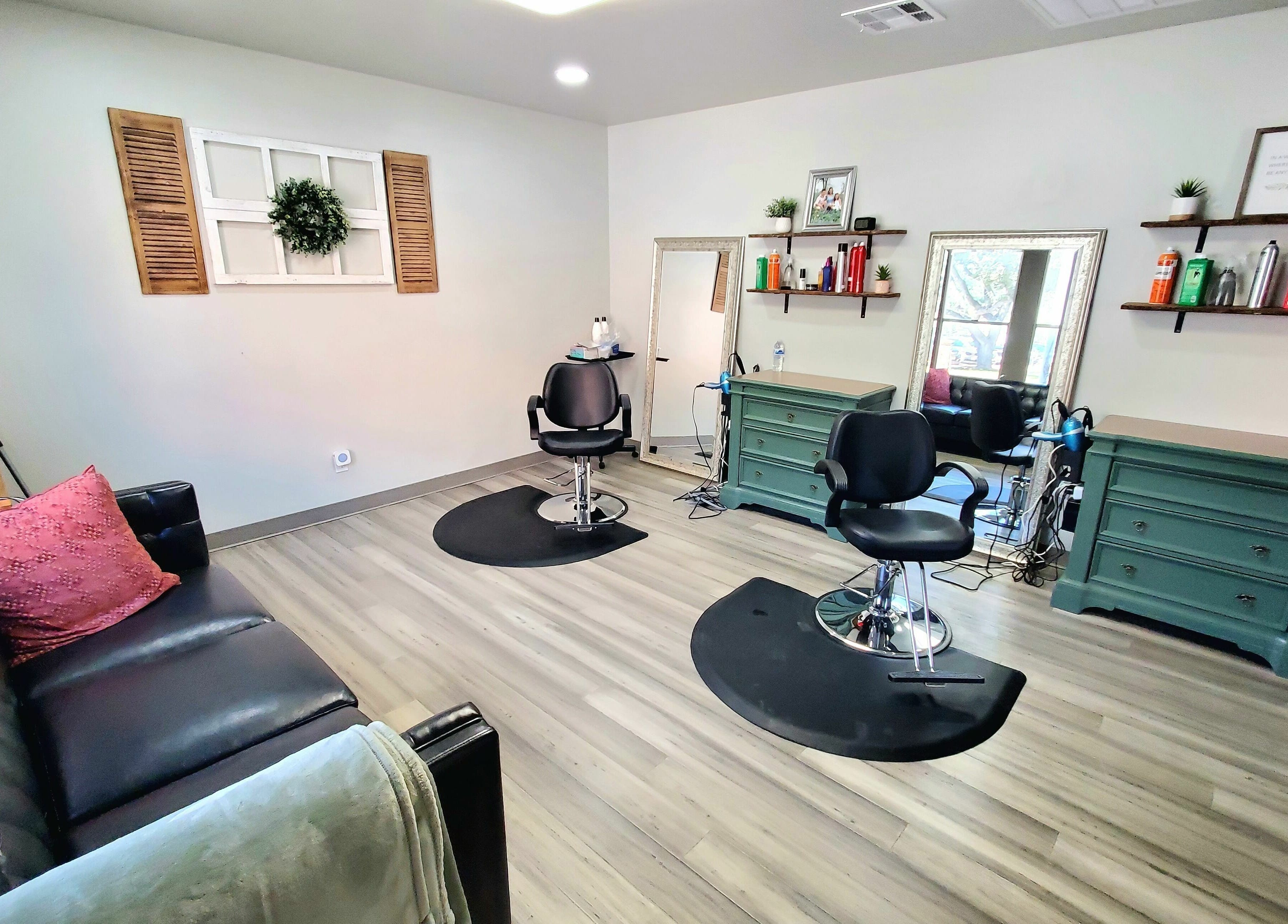 Modern salon interior at Live Oak Salon in Katy, Texas, US, featuring stylish seating and elegant decor.