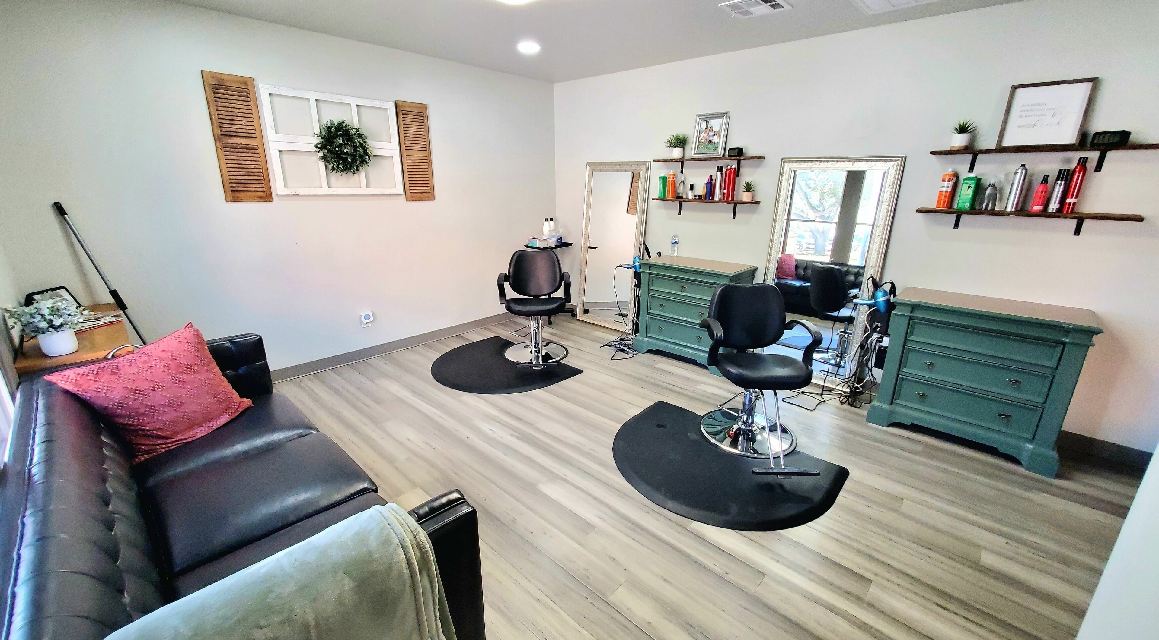 Modern salon interior at Live Oak Salon in Katy, Texas, US, featuring stylish seating and elegant decor.