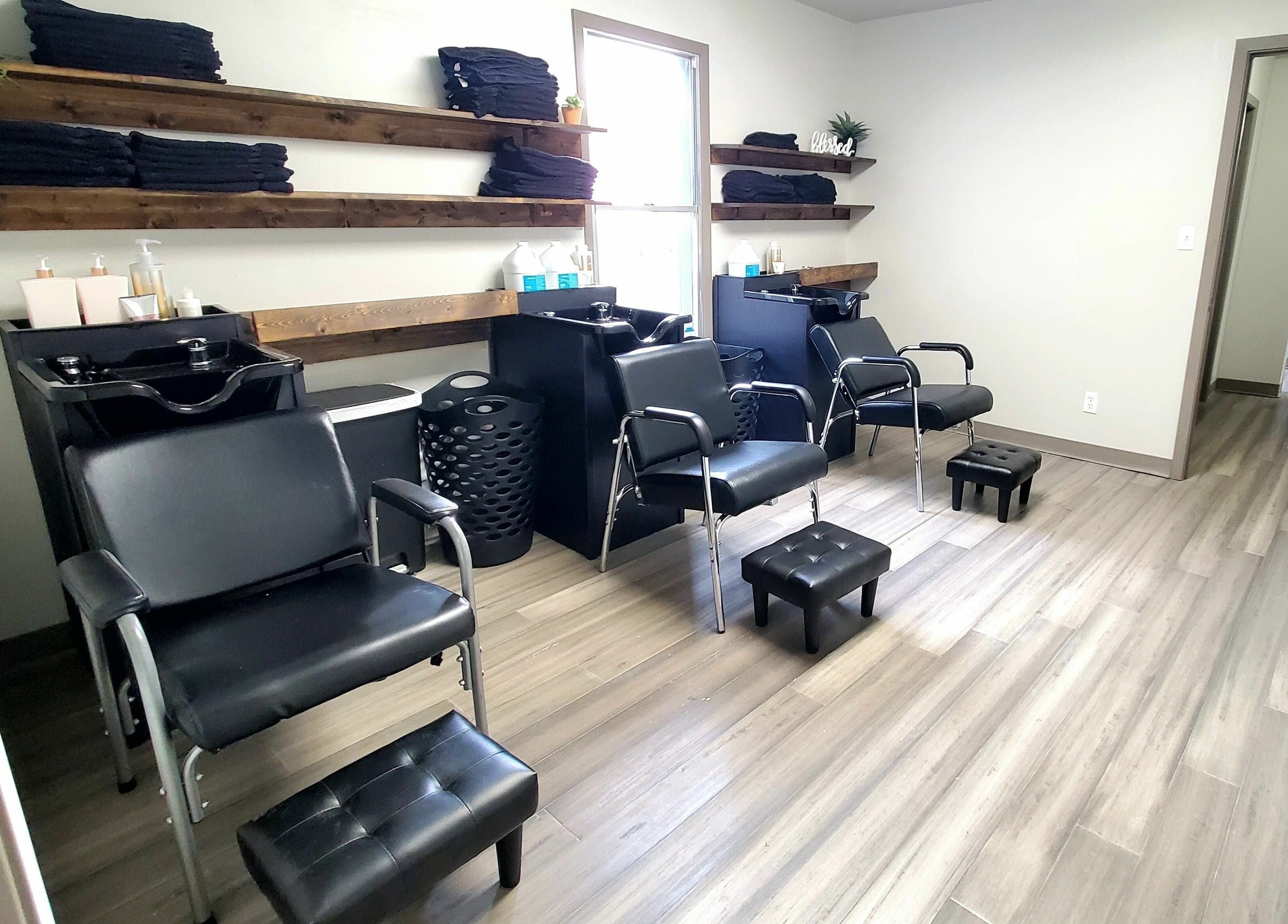 Modern beauty stations at Live Oak Salon, Katy, Texas, US, featuring sleek chairs and stylish decor.