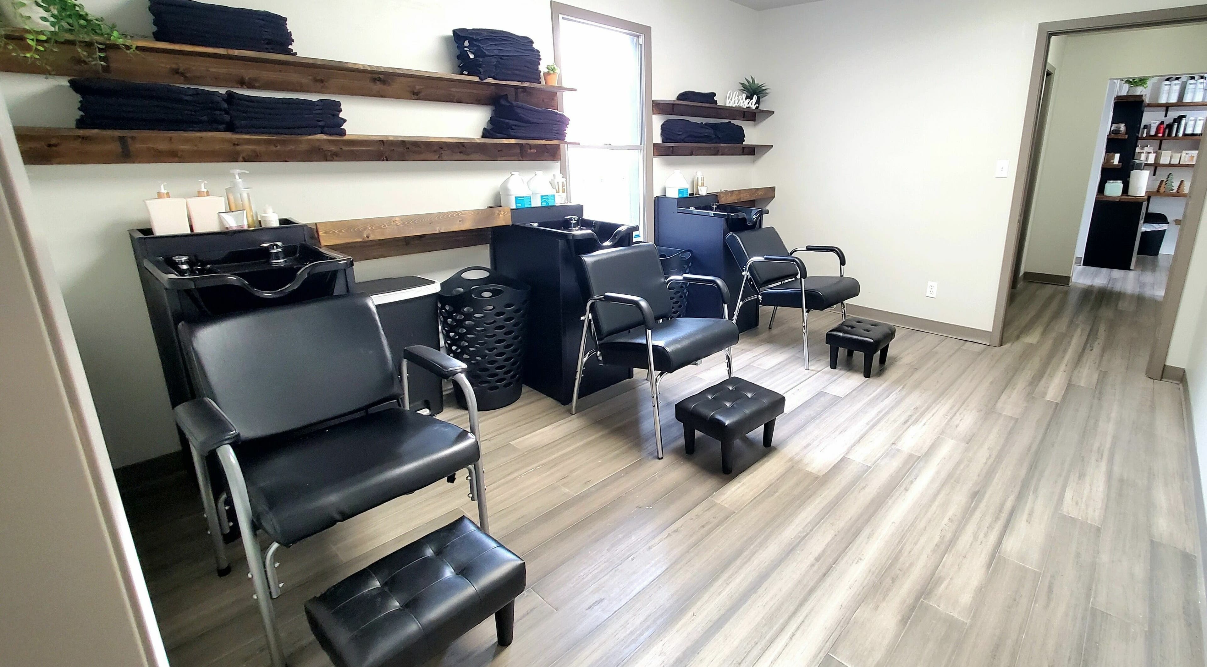 Modern beauty stations at Live Oak Salon, Katy, Texas, US, featuring sleek chairs and stylish decor.