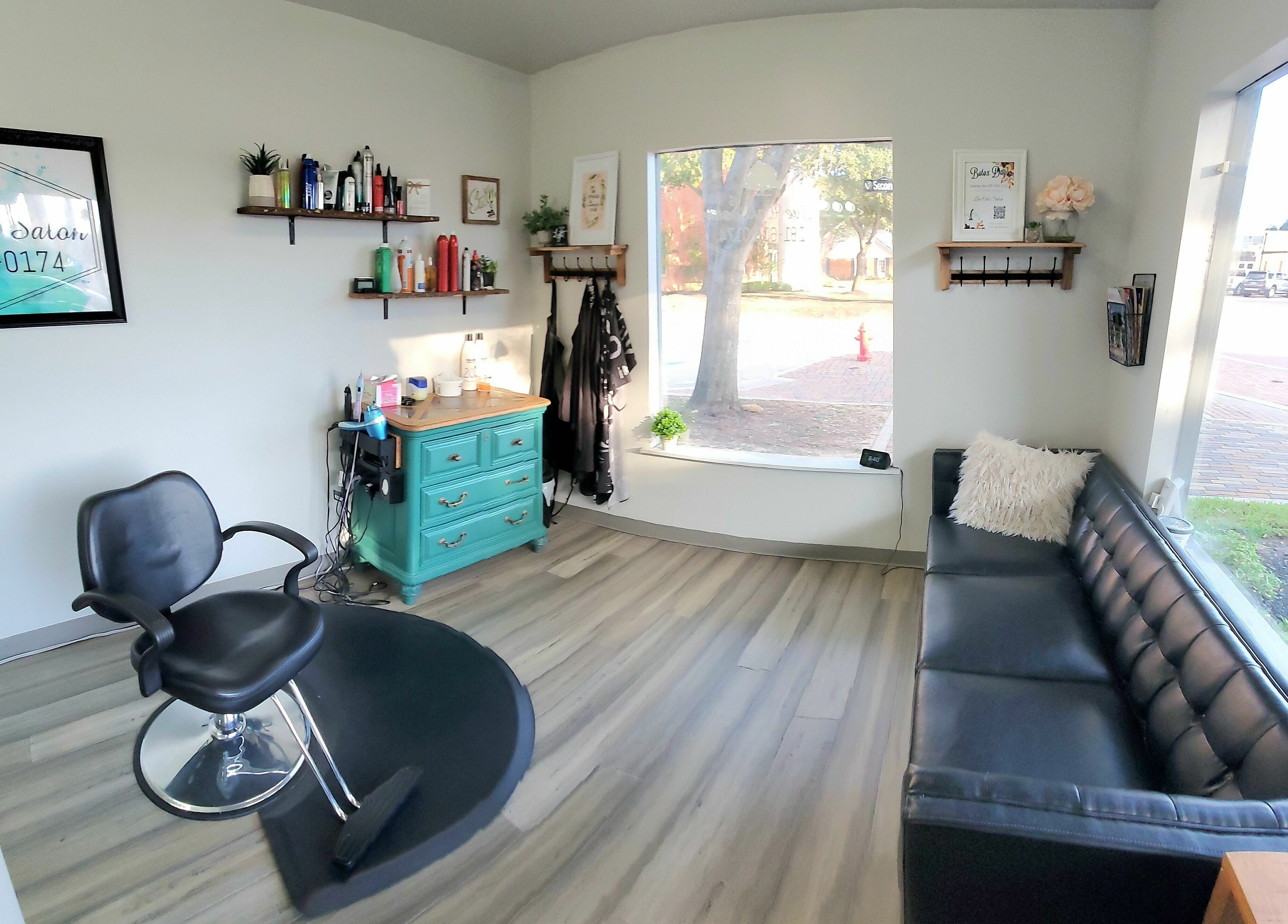 Cozy interior of Live Oak Salon with styling station in Katy, Texas, US, highlighting elegant decor.