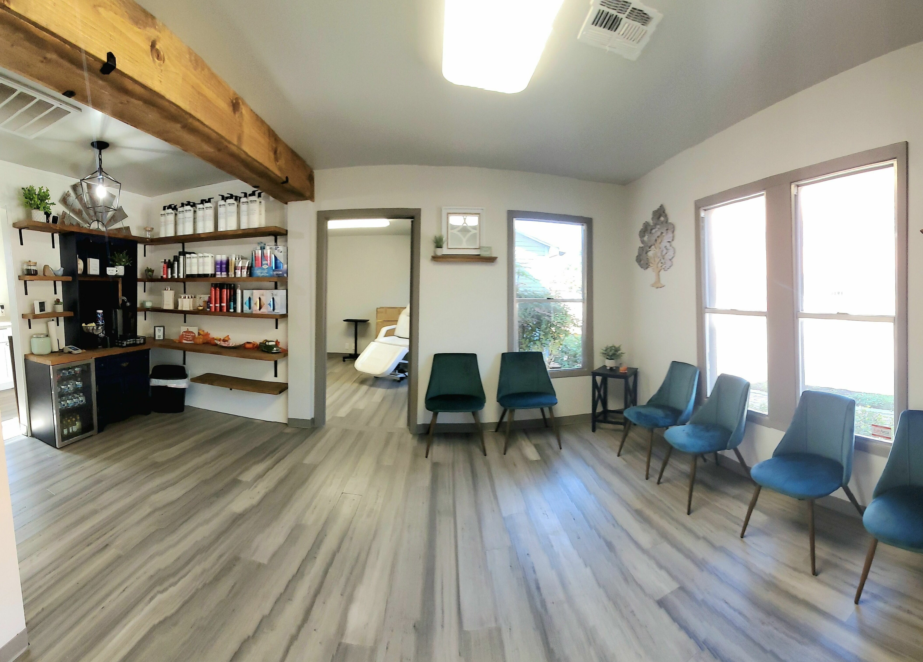Inviting waiting area at Live Oak Salon in Katy, Texas, US with modern decor and plush seating.