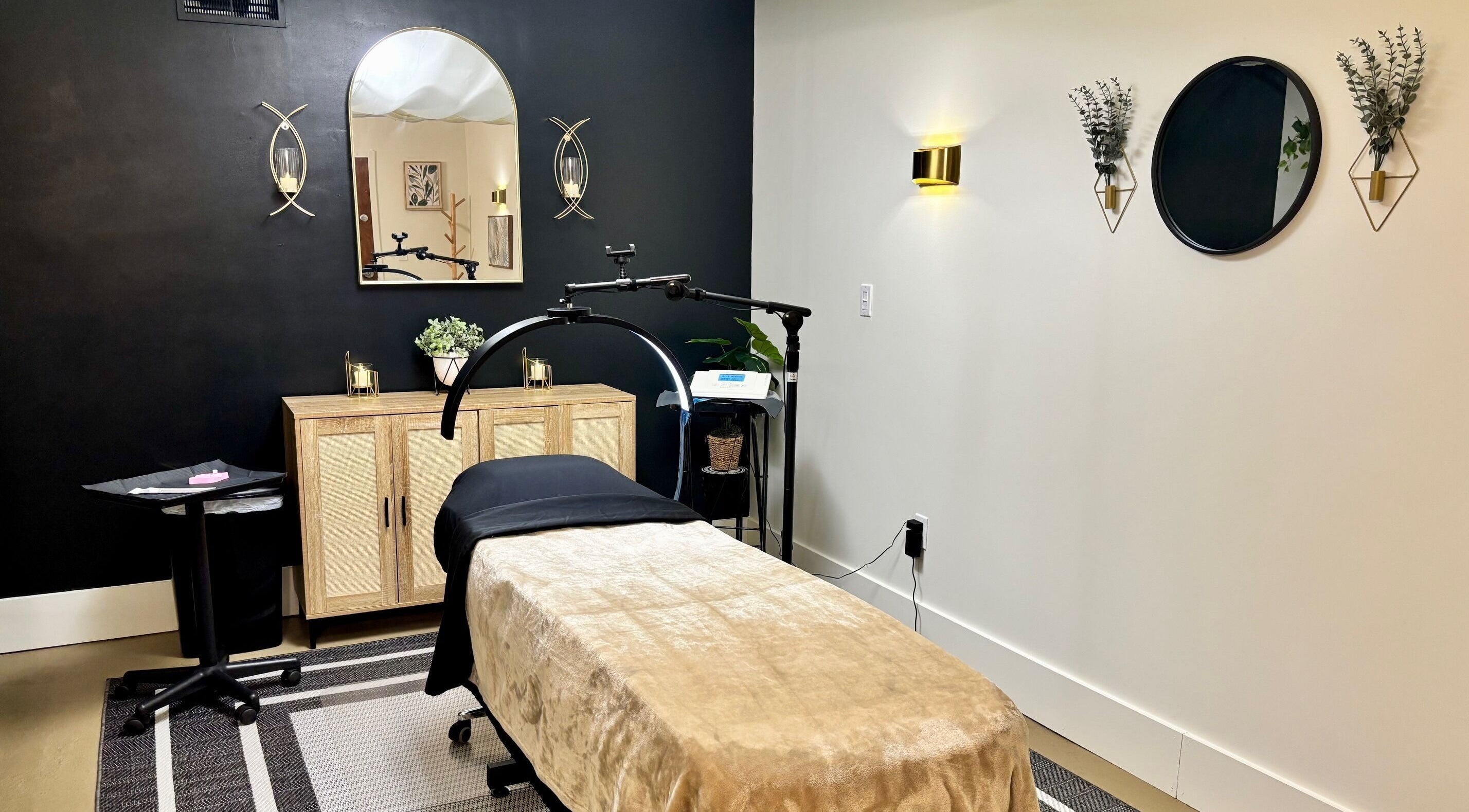 Elegant treatment room at Permanently Perfect Makeup, Pittsburgh, Pennsylvania, US, featuring stylish decor.