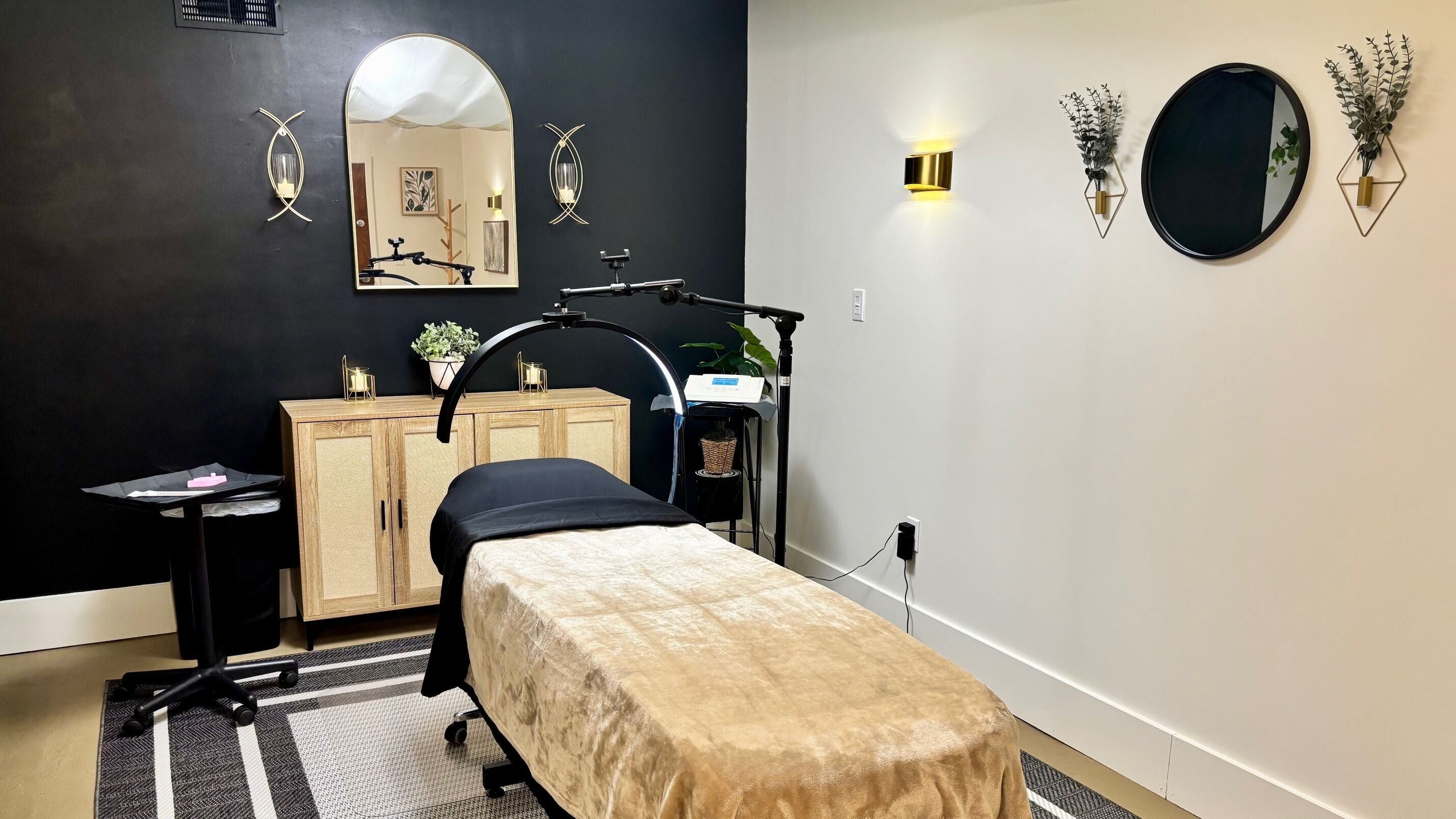 Elegant treatment room at Permanently Perfect Makeup, Pittsburgh, Pennsylvania, US, featuring stylish decor.