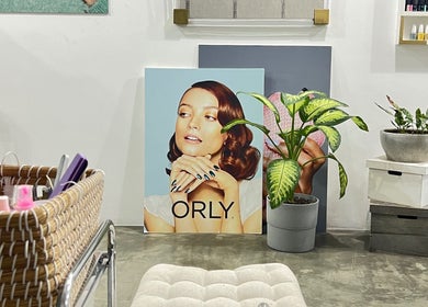 Decorative plants and beauty posters in Color Cravings Beauty Salon, Bu Quwah, Northern Governorate, BH.