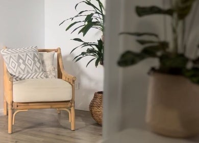 Relaxing bamboo chair at Phoenix Remedial Massage, Belford, New South Wales, AU, enhances calm ambiance.