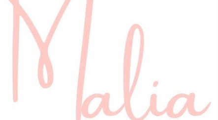 Elegant logo of Malia Hair and Beauty Boutique in pink text, Hastings, Victoria, AU.
