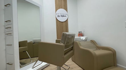 Modern salon chair and mirror at Hair Extensions by Stephanie, Bonita Springs, Florida, US.