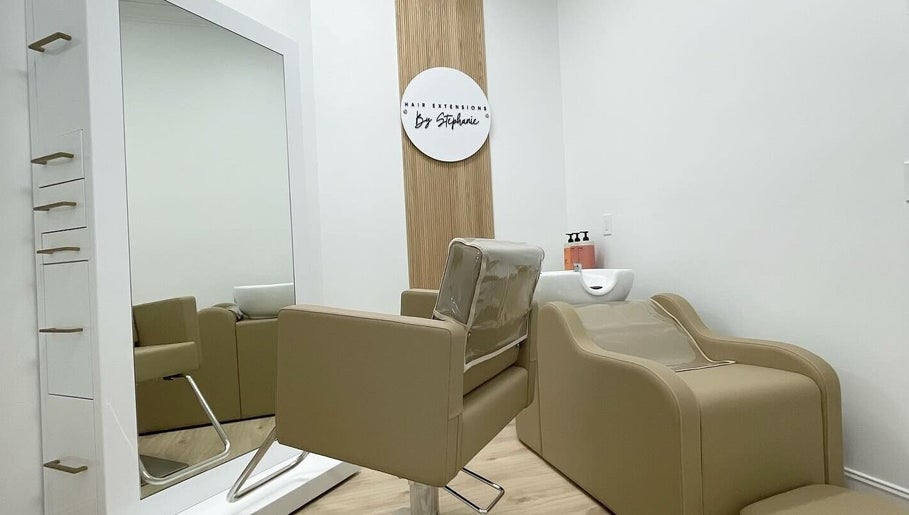 Modern salon chair and mirror at Hair Extensions by Stephanie, Bonita Springs, Florida, US.