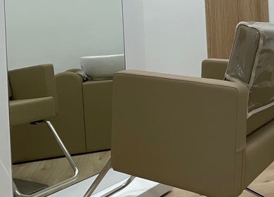 Modern salon chair at Hair Extensions by Stephanie, Bonita Springs, Florida, US.
