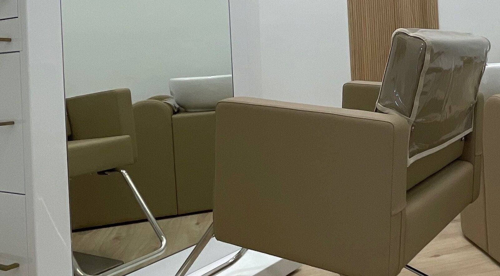 Modern salon chair at Hair Extensions by Stephanie, Bonita Springs, Florida, US.