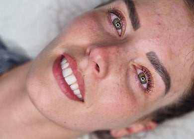 Close-up of a smiling face post-treatment at Xtreme Beauty (Mobile Therapist), Ponteland, England, GB.