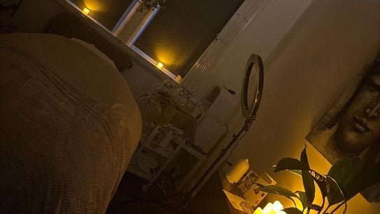 Warm, cozy interior of Xtreme Beauty (Mobile Therapist) in Ponteland, England, GB with soft candle lighting.