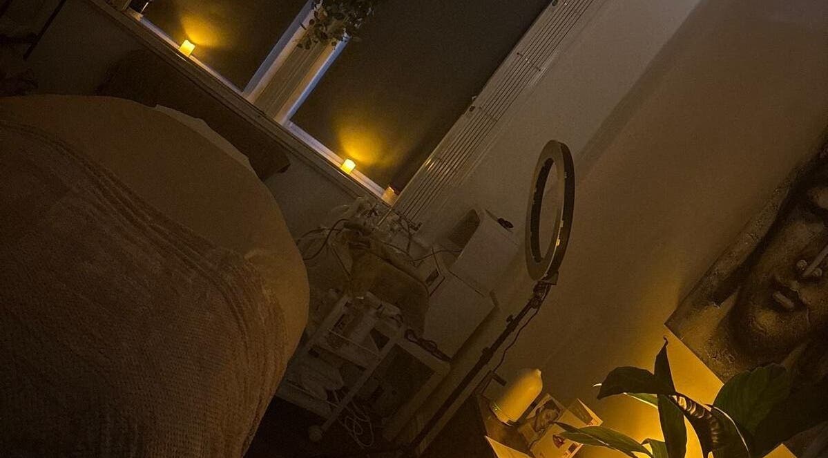 Cozy treatment room at Xtreme Beauty (Mobile Therapist), Ponteland, England, GB with warm lighting and decor.