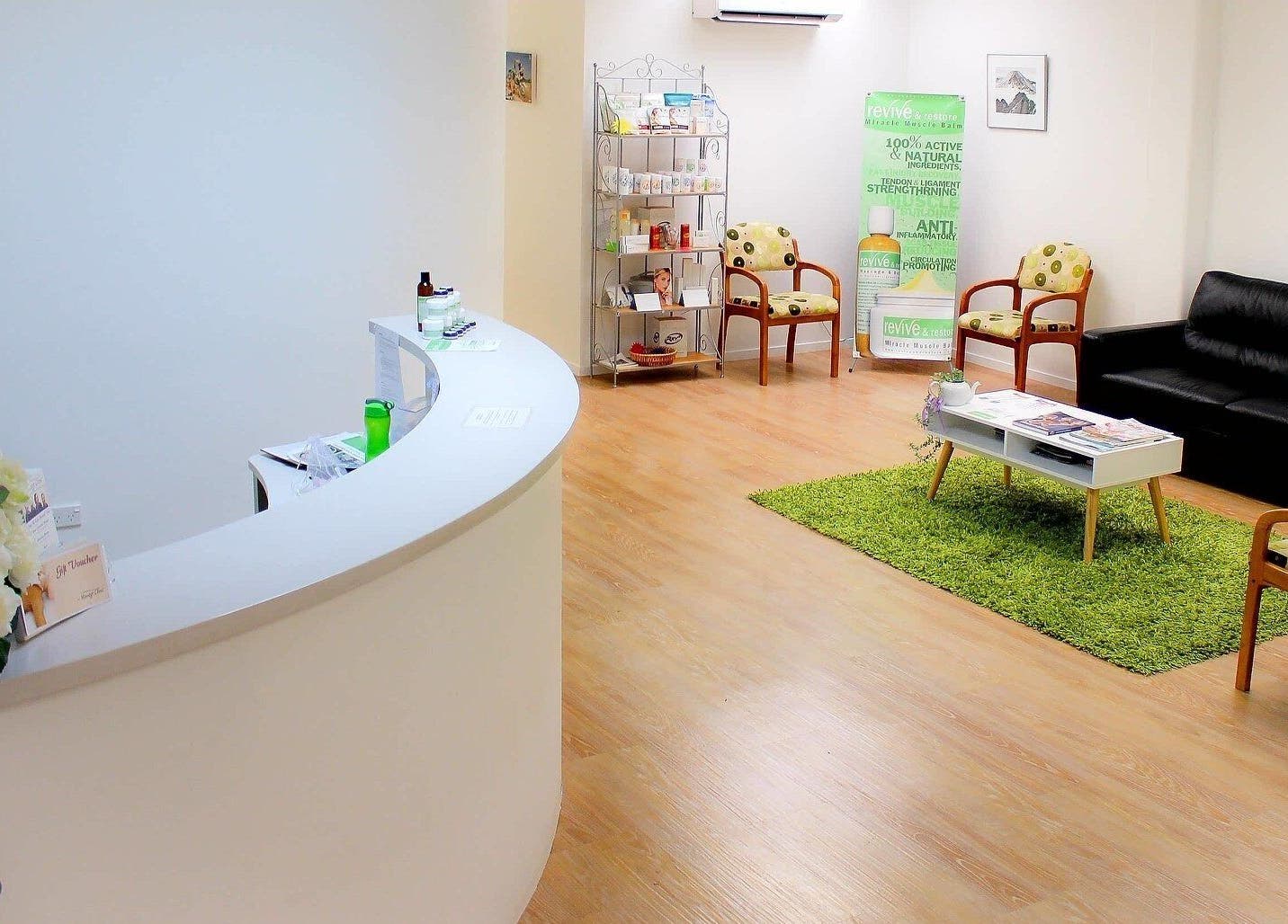 Welcoming lobby of The Massage Clinic, Taupo, Waikato, NZ with comfortable seating and soothing decor.