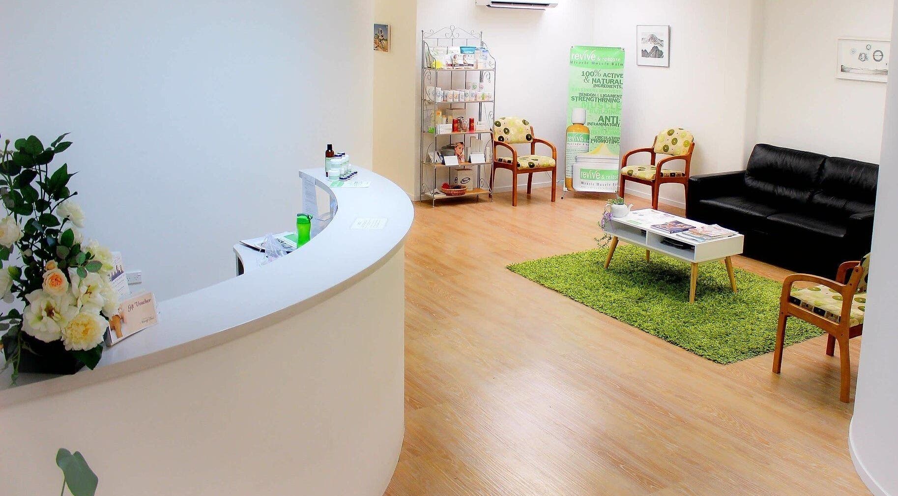 Welcoming lobby of The Massage Clinic, Taupo, Waikato, NZ with comfortable seating and soothing decor.