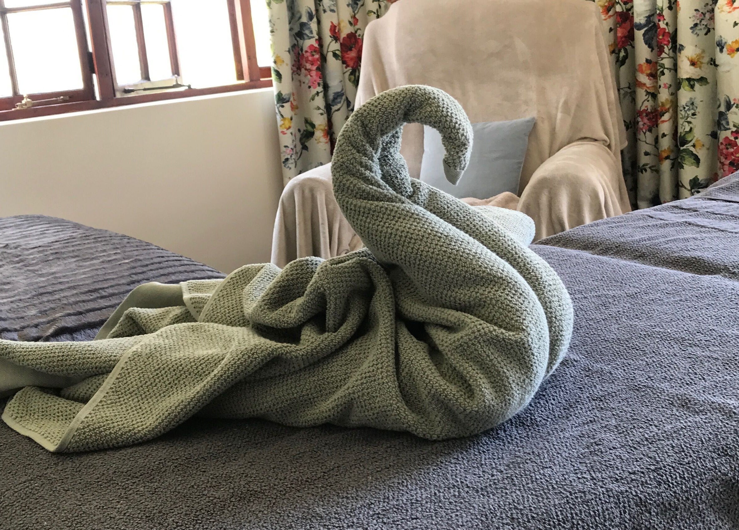 Relaxing spa bed at Chrystell Health and Wellness Mobile Spa in Roodepoort, Gauteng, ZA with towel art.