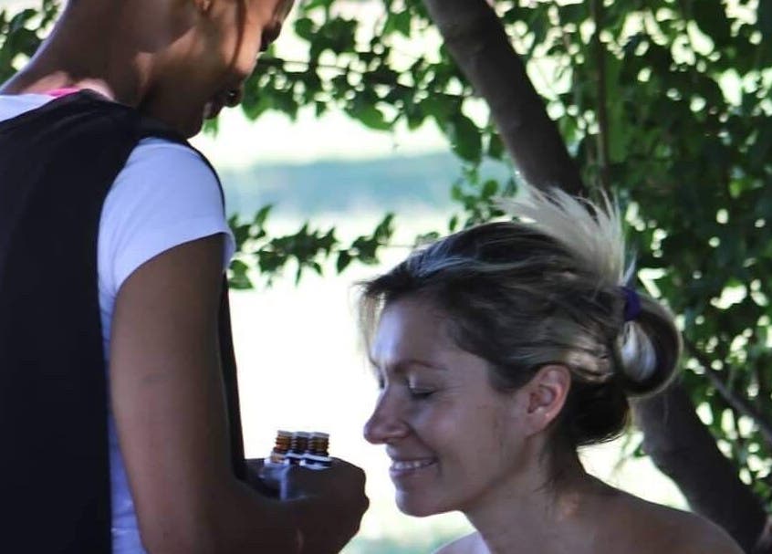 Relaxation session at Chrystell Health and Wellness Mobile Spa in Roodepoort, Gauteng, ZA, under a calming tree.