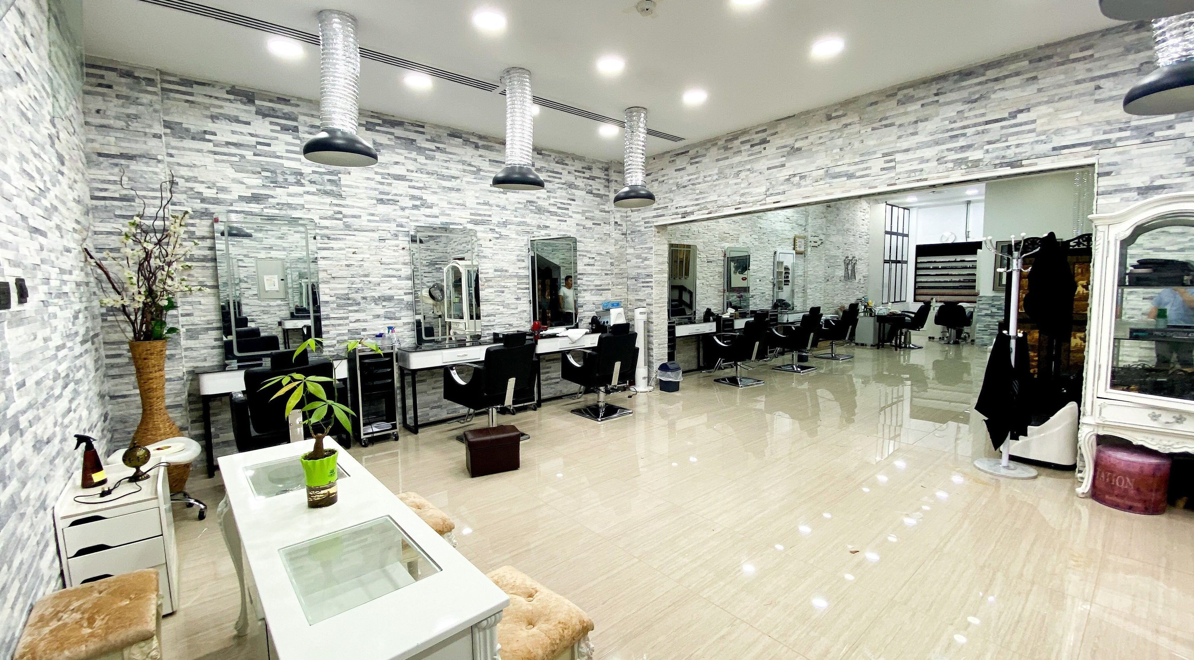Elegant interior of Companion Beauty Salon Spa, Dubai Nad Al Hamar Br in Dubai, Dubai, AE with modern styling chairs.