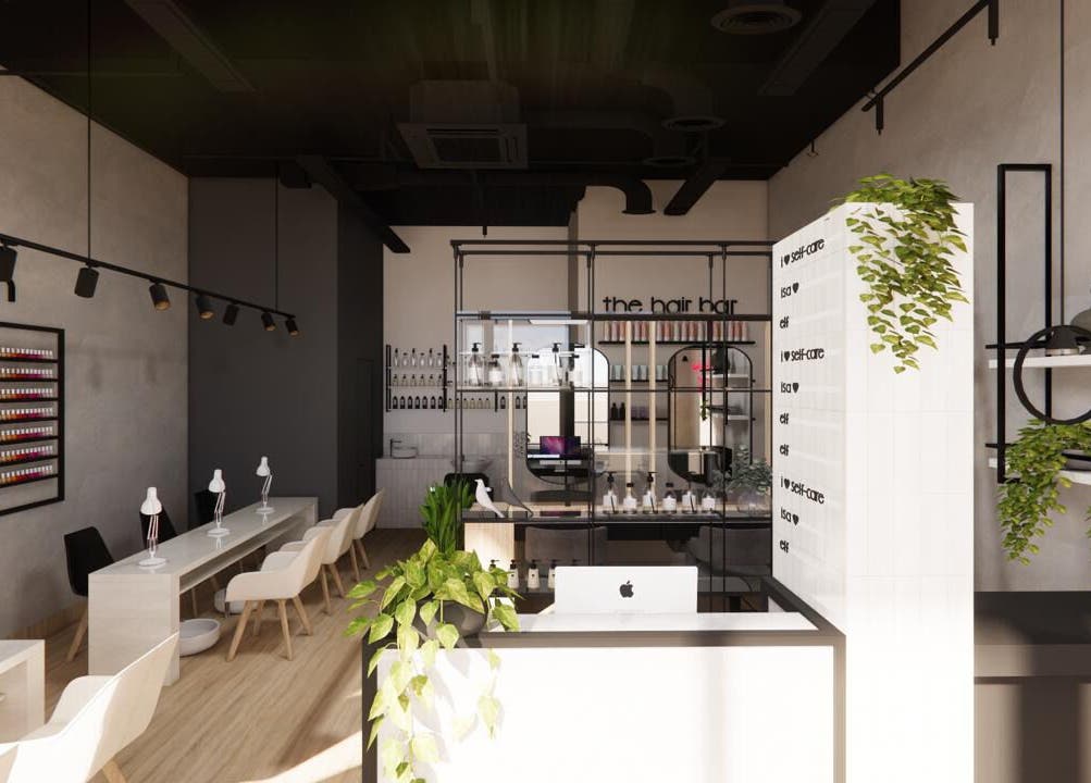 Interior moderno de The Nail Kitchen Villa Club en Daule, Guayas, EC, destacando estación de uñas y productos.