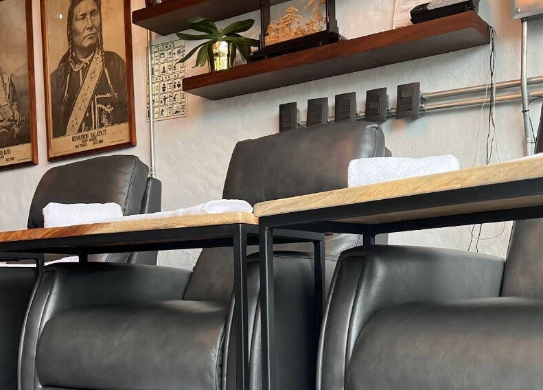 Modern seating area at Waxing4Men, Puerto Vallarta, Jalisco, MX showcasing comfort and style.