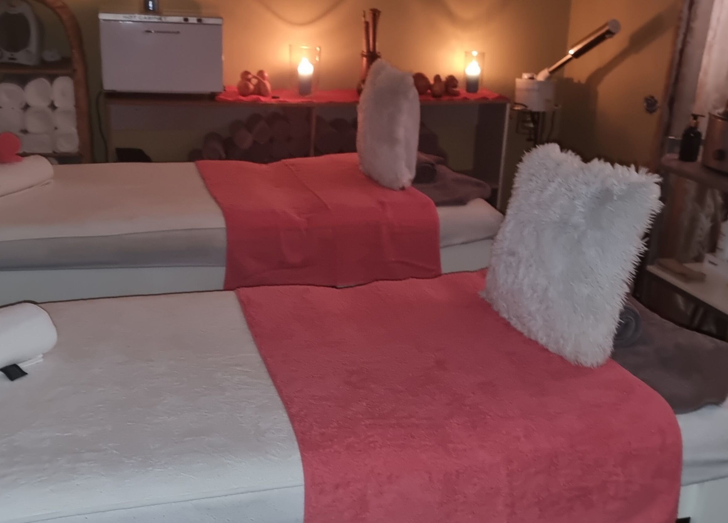 Warm, inviting massage room at Zoella Day Spa, Bela-Bela, Limpopo, ZA with plush towels and ambient lighting.