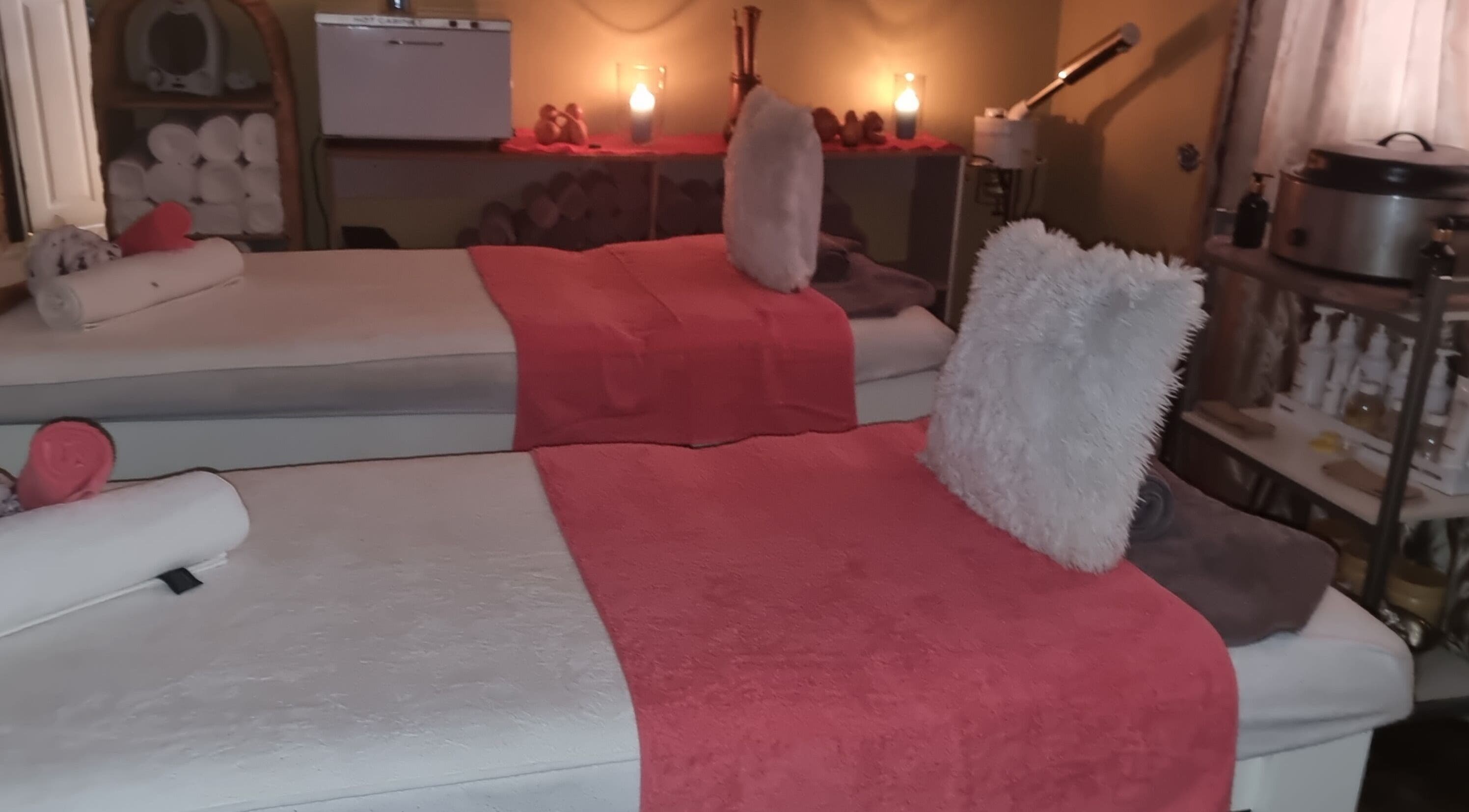 Warm, inviting massage room at Zoella Day Spa, Bela-Bela, Limpopo, ZA with plush towels and ambient lighting.