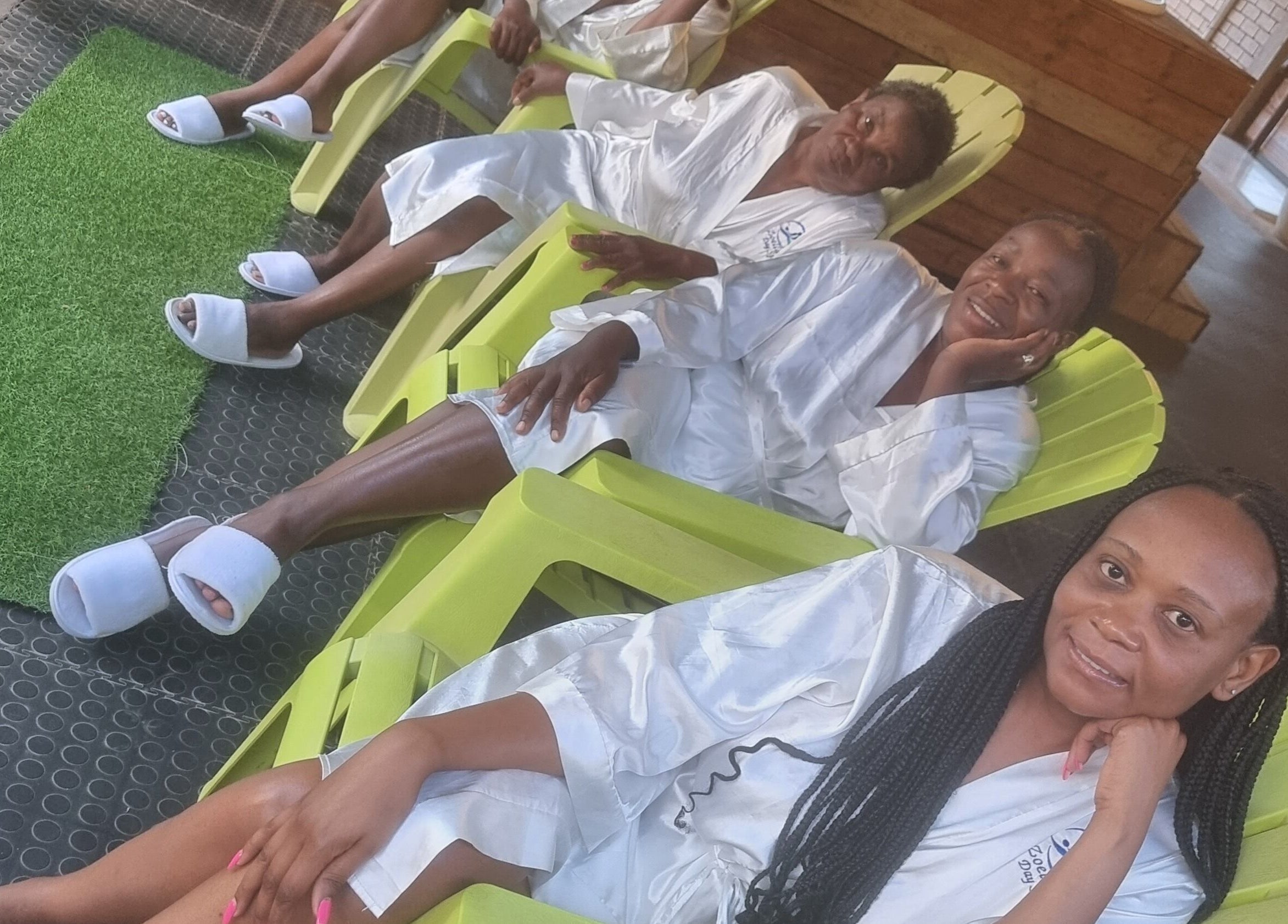 Guests in robes lounging at Zoella Day Spa, Bela-Bela, Limpopo, ZA, enjoying a serene retreat.