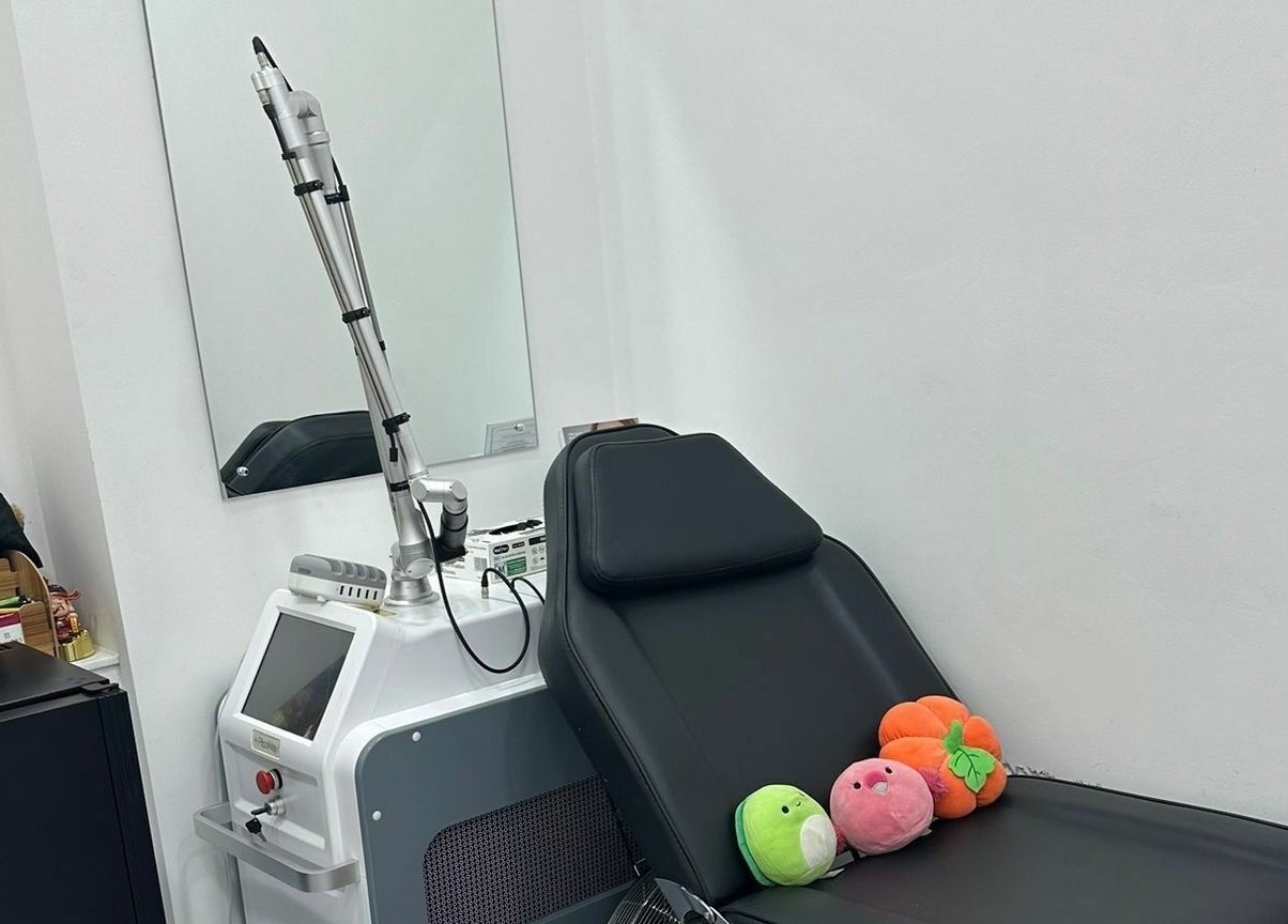 A sleek laser treatment room at Z.Z SkinCare London, London, England, GB with plush toys on the chair.