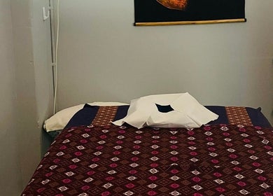 Relaxing massage room at Narree Thai Massage & Spa, Wingham, New South Wales, AU with a welcoming atmosphere.